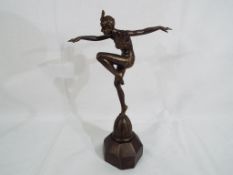 An Art Deco style figurine depicting a lady in a bathing costume approx 24.