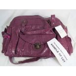 Five lady's good quality leather oversized plum coloured handbags,