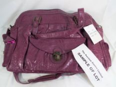 Five lady's good quality leather oversized plum coloured handbags,