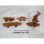 A quantity of 28 wooden push-along toys, all boxed to include crocodiles, penguins, pigs,
