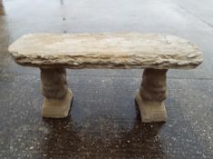 Garden Stoneware - a curved stone bench