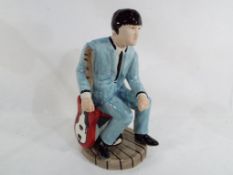 Lorna Bailey - a Lorna Bailey figurine depicting John Lennon issued in a limited edition of 100,