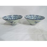 A pair of Chinese ceramic deep form bowls, blue and white decoration approx 6.5cm (h) 14.