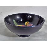 Moorcroft pottery - a small Moorcroft pottery footed bowl decorated with the orchid pattern on a