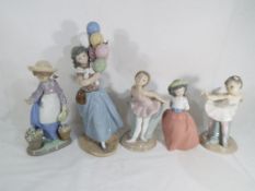 Lladro - two Lladro figurines comprising #5141 Balloon Seller and #5543 Hello Flowers (a/f),