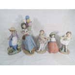 Lladro - two Lladro figurines comprising #5141 Balloon Seller and #5543 Hello Flowers (a/f),