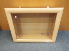A good quality wooden display cabinet with five glass shelves,