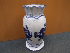 A very vase by Blakeney, blue and white with a floral decoration,
