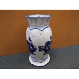 A very vase by Blakeney, blue and white with a floral decoration,