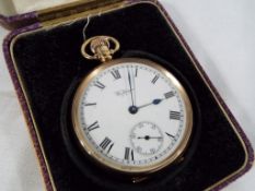 A gentleman's 9 carat gold cased pocket watch, white enamel dial with Roman numerals,