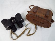 A pair of Bausch & Lomb 6x30 binoculars inscribed CCB733 (marked with crow's foot) and contained in