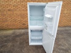 A Beko A class frost free fridge freezer with water dispenser - This lot MUST be paid for and
