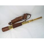 A good quality brass telescopic telescope with leather carry case marked T.