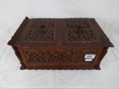 A wooden ornate boxed containing a large quantity of watches - This lot MUST be paid for and