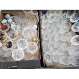 A good lot to include a large quantity of crystal glassware comprising wine glasses, goblets,