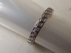 A lady's 9 carat gold 15 point diamond set full eternity ring, approx 2.
