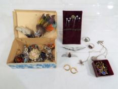 A mixed lot of vintage jewellery to include some hallmarked 9 carat gold earrings, also silver,