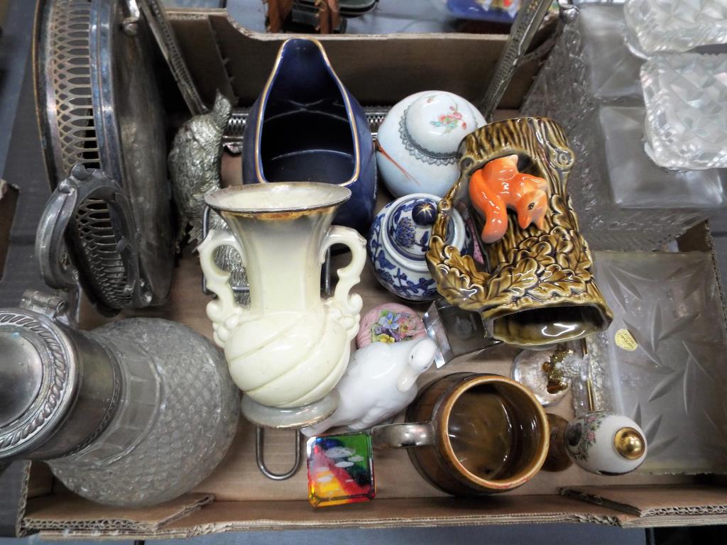 A good mixed lot to include 2 decanters, mixed ceramics to include Wade, Sylvac, Nao and similar,