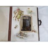 A vintage musical photograph album entitled 'The Seasons' with colour decorated pages featuring