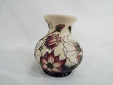 Moorcroft Pottery - a Moorcroft Pottery vase decorated in the Bramble Revisited pattern, 9.