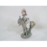 Lladro - a Lladro figurine entitled Look at Me #5465 depicting a girl riding a donkey,