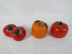 Three Chinese porcelain models of fruit and vegetables,