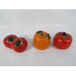 Three Chinese porcelain models of fruit and vegetables,