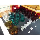 A quantity of good quality retro style drinking glasses,