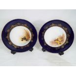 Royal Worcester - a pair of large Royal Worcester plates with blue and gilt rim,