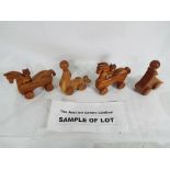 32 wooden push along toys to include sea lions and bears riding horses - This lot MUST be paid for