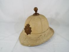 A Royal Marine Gibraltar Pith helmet by Hobson and Sons brass Gibraltar plate size 7 - This lot