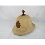 A Royal Marine Gibraltar Pith helmet by Hobson and Sons brass Gibraltar plate size 7 - This lot