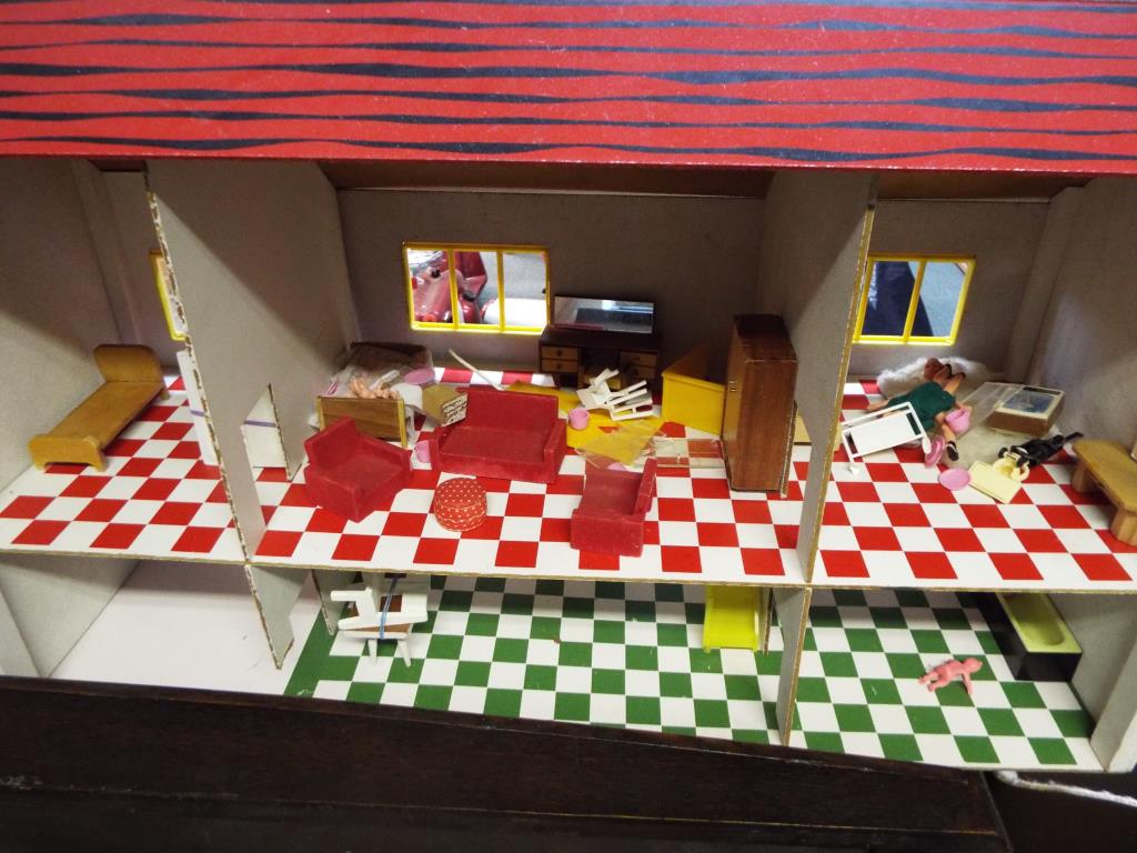 Dolls House - a two storey dolls house of wooden construction with furniture 44cm x 33cm x 73cm - - Image 2 of 2