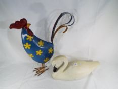 A good quality metal garden ornament depicting a cockerel and a wooden model of a swan (2) - This