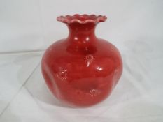 Burmantofts - a large ovoid form dimple vase by Burmantofts,