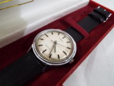 A 1960s gentleman's Timex wristwatch with leather strap,