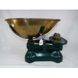 A set of large cast iron and brass weighing scales with weights 33 cm (h) - This lot MUST be paid