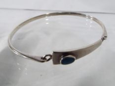 A ladies silver stone set bracelet Est £