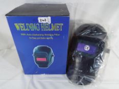 A welding helmet with auto-darkening fil