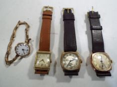 A good lot of three vintage 9 carat gold cased wristwatches,
