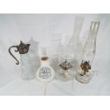 Two glass oil / paraffin lamps,