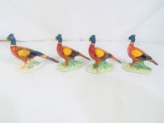 Beswick - Four small Beswick figurines of pheasants, one # 767A with curved tail,