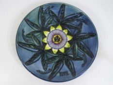 Moorcroft Pottery - A large 1992 Moorcroft pottery Year Plate decorated with passion flower,