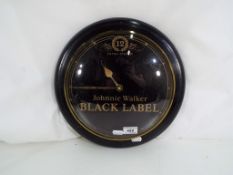 Advertising wall clock for Johnnie Walker Black Label