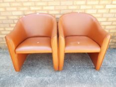 A pair of matching super quality tan leather tub chairs Est £20 - £40