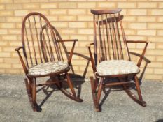 Ercol - Two Ercol rocking chairs. (2). Est £60 - £100.
