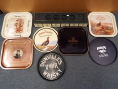 Breweriana - a lot to include seven vintage Whisky advertising trays to include Famous Grouse,