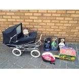 A Silver Cross dolls pram, three soft toy Meerkats,