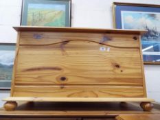 A good quality pine linen chest with metal handles, approximately 50 cm x 85 cm x 39 cm.