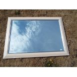 A good quality modern bevel edged wall mirror from Britannia mirrors overall size 76cm x 107cm